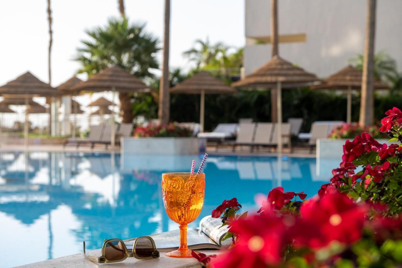 Hotel Aria Ejlat Exteriér fotografie A glass of Aperol Spritz